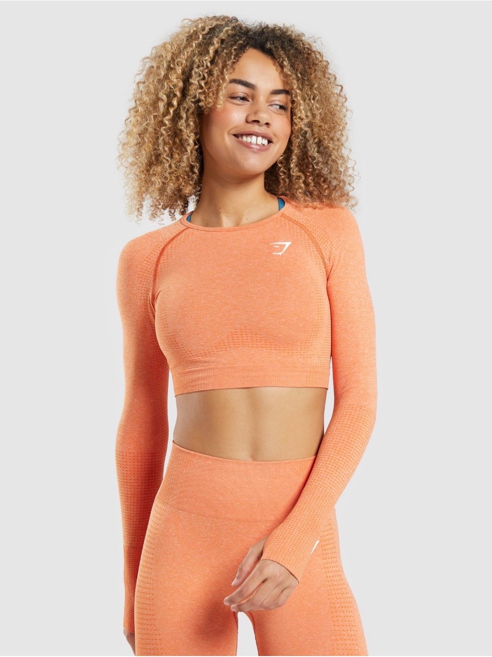 Gymshark Vital‎ Seamless 2.0 Long Sleeve Crop Top in Apricot Orange
Marl